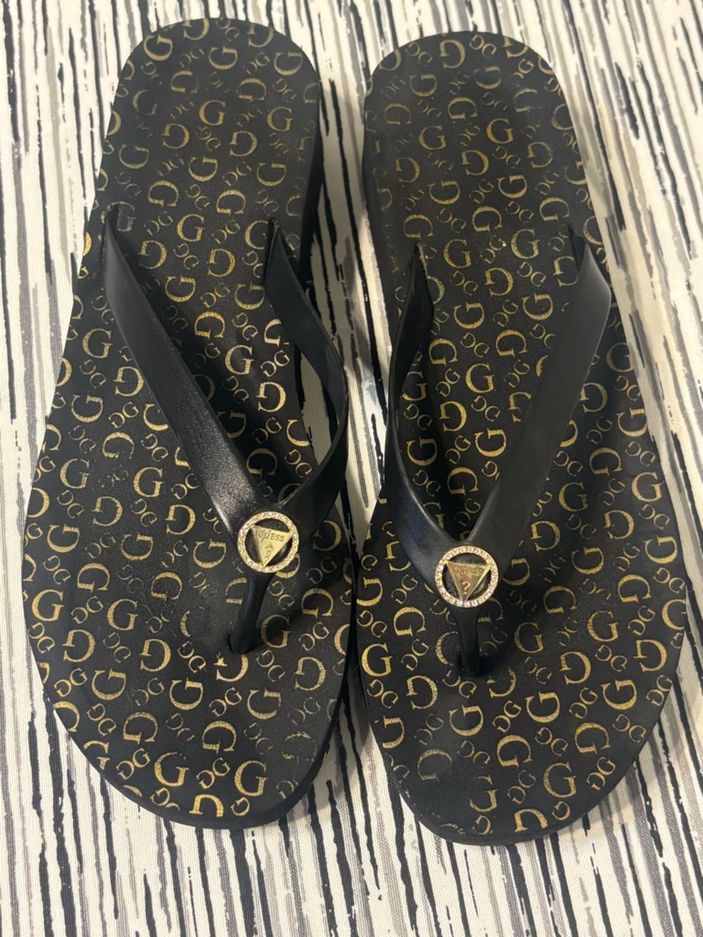 Guess Black and Gold Logo Flip Flop Sandals